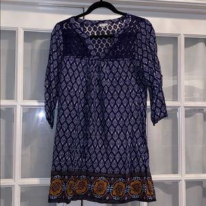 Navy patterned dress with lace top.